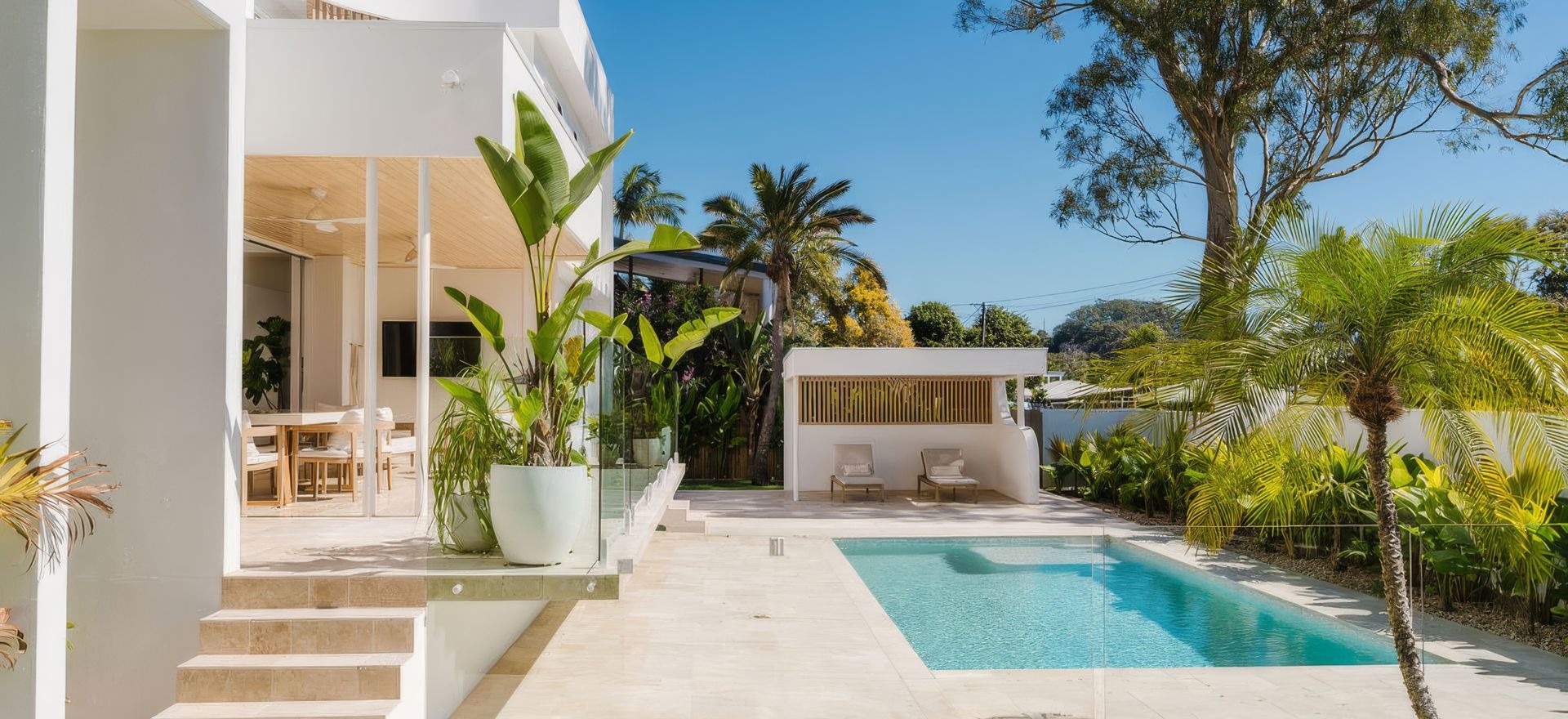 Natural travertine brings resort-style luxury to this Sunshine Coast residence