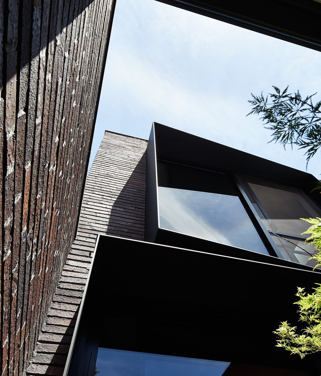 A monochromatic modern architectural feat immersed within a heritage building