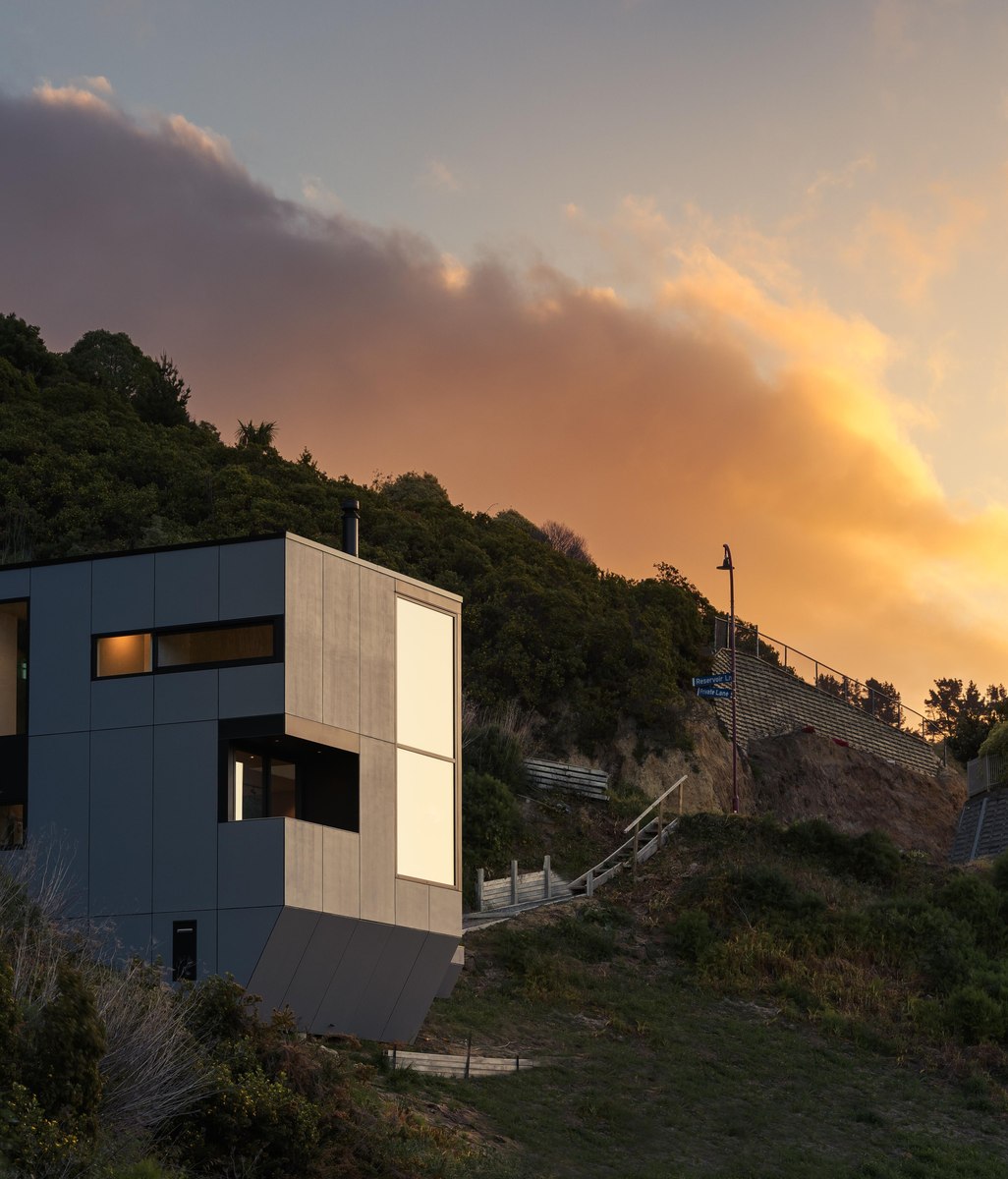 A distinctive bunker-like residence commands attention nestled in the hills of Christchurch