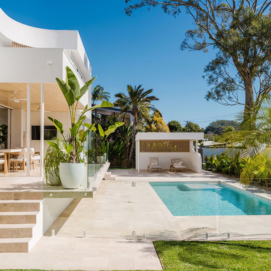 Natural travertine brings resort-style luxury to this Sunshine Coast residence