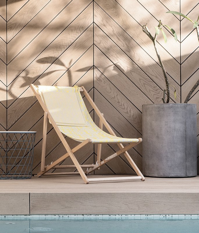 Herringbone style Golden Oak screening around pool deck