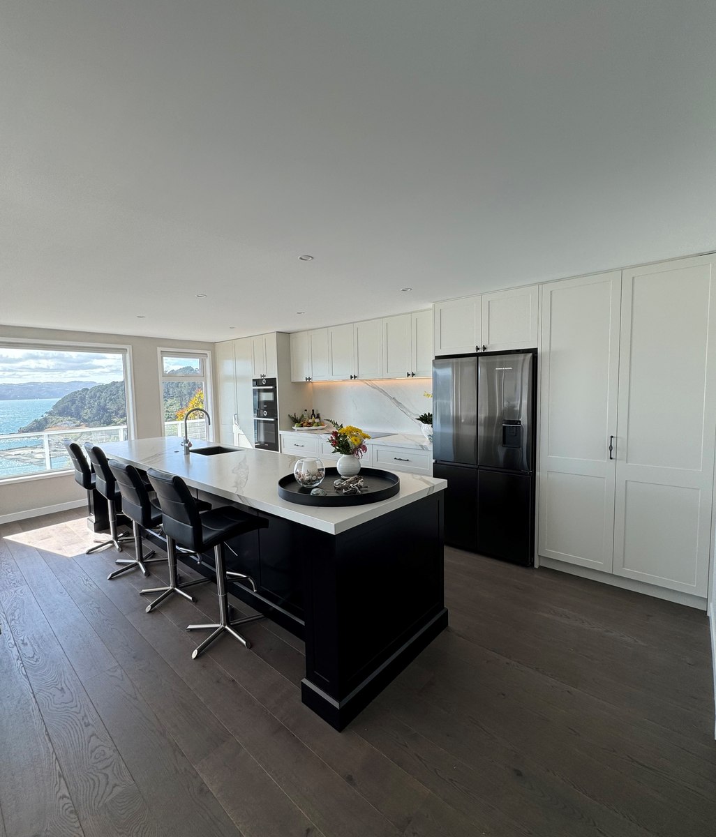 High-end hideaway: Kitchen case study shows clever use of REVEGO pocket door systems.