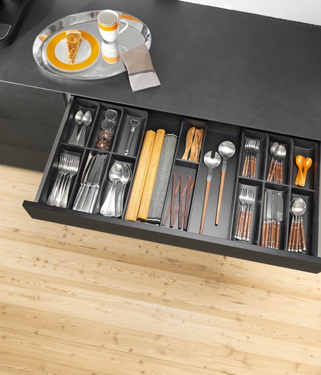 Reorganise kitchen storage now for a seriously relaxing summer.