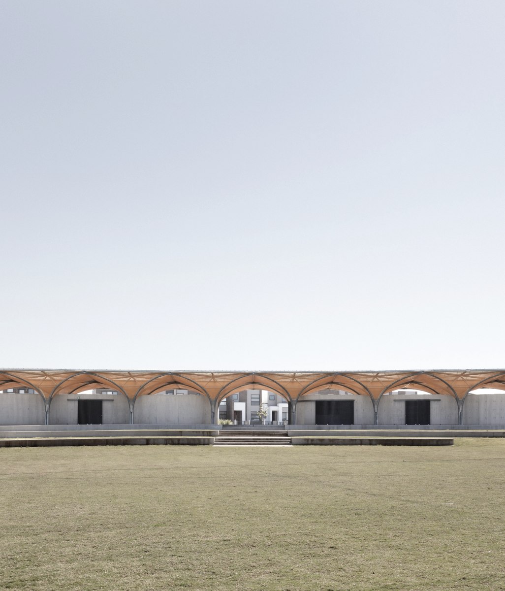 Golden Mesh Shades a Sports Pavilion in Sydney