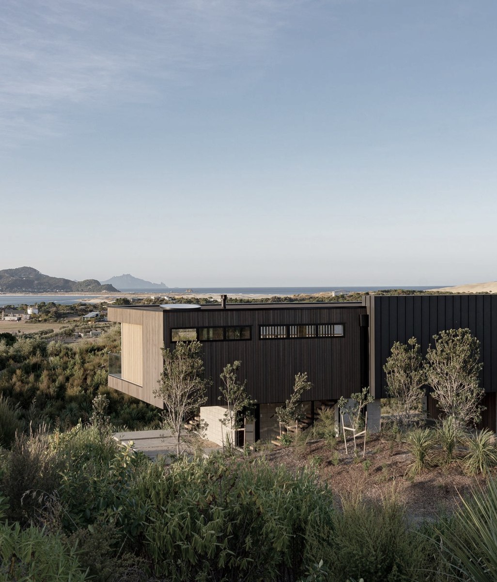A cedar-clad coastal retreat celebrates modernist design