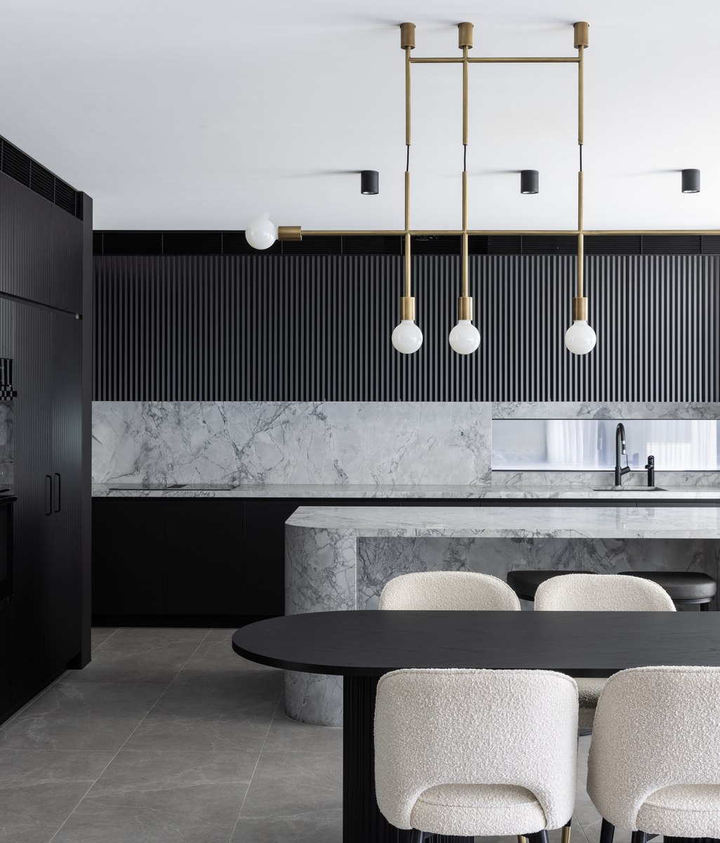 Sleek and moody: take a look inside this young family’s Sydney home