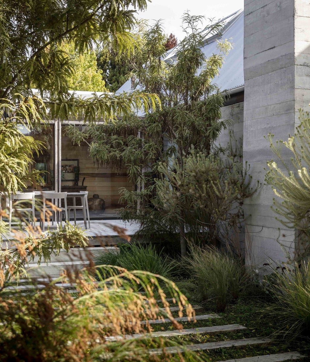 How landscaping experts design gardens that encourage biodiversity and thrive in changing climate conditions