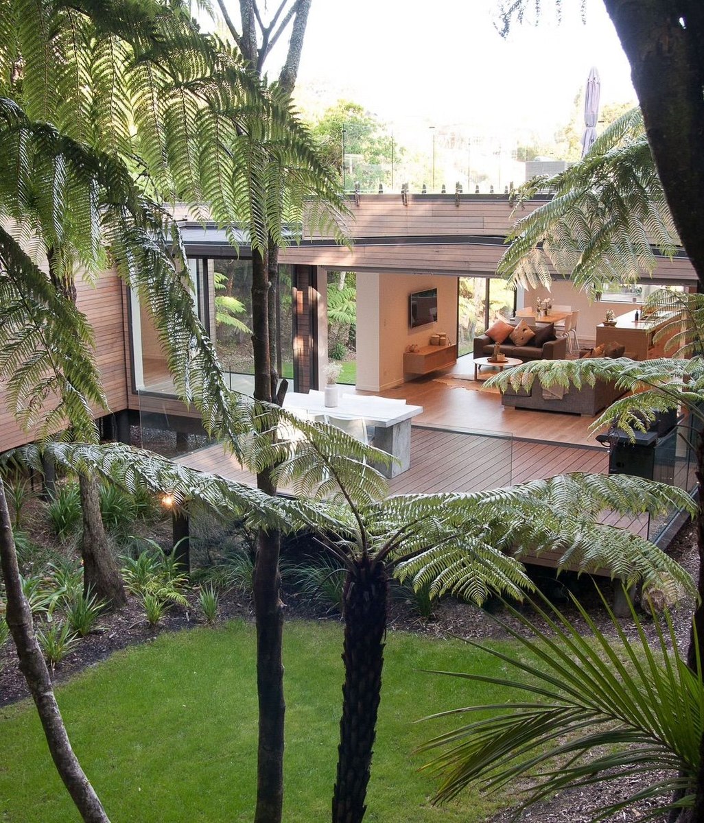 Embraced by native bush, this stunning home is at one with the land