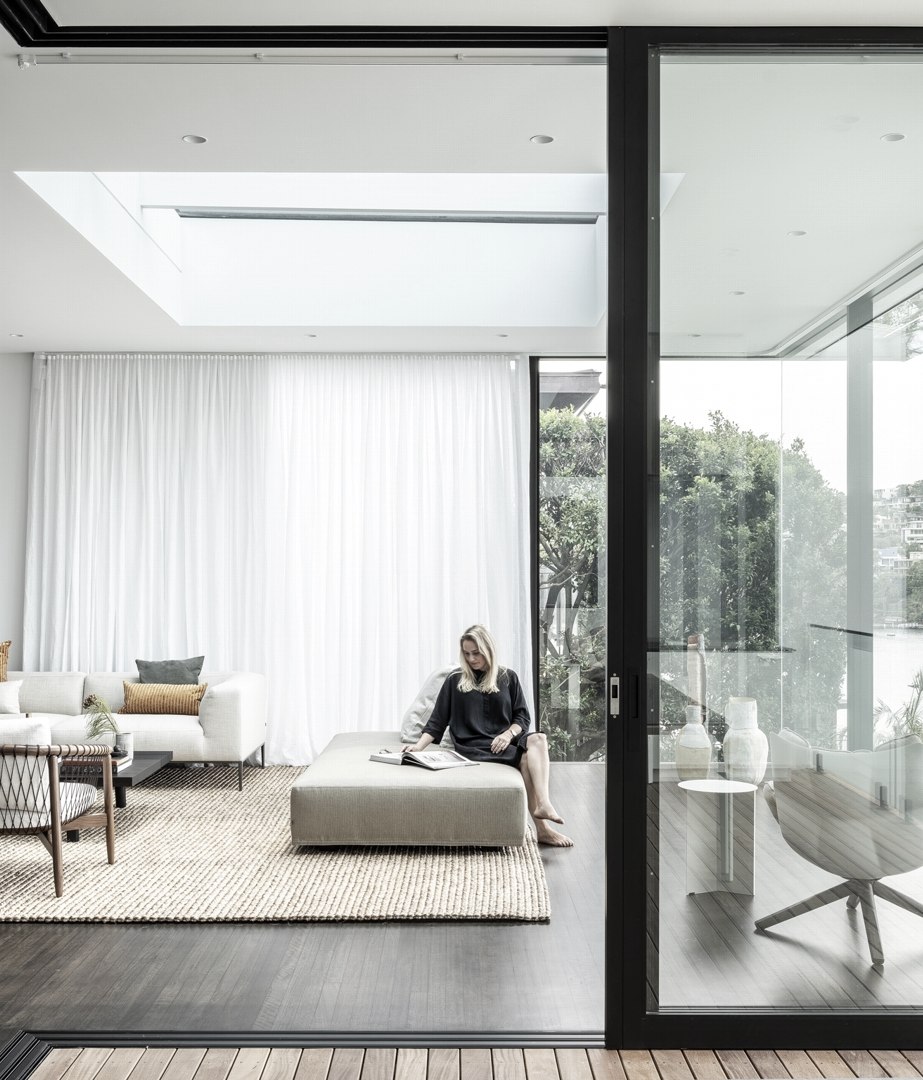 A serene and sophisticated abode cascading down to the water