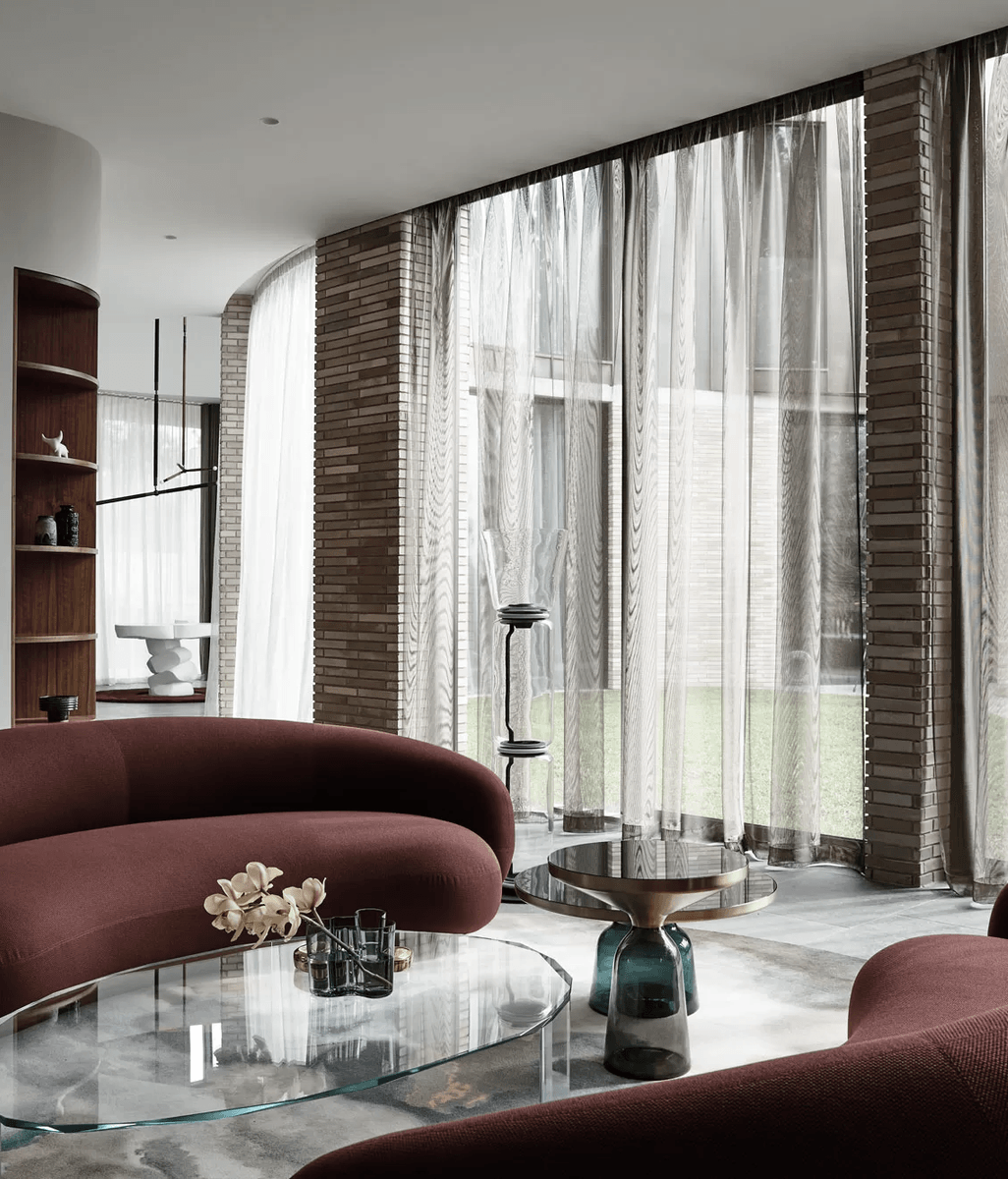 Rich materiality lends a feminine touch to this Brutalist entertainers’ paradise