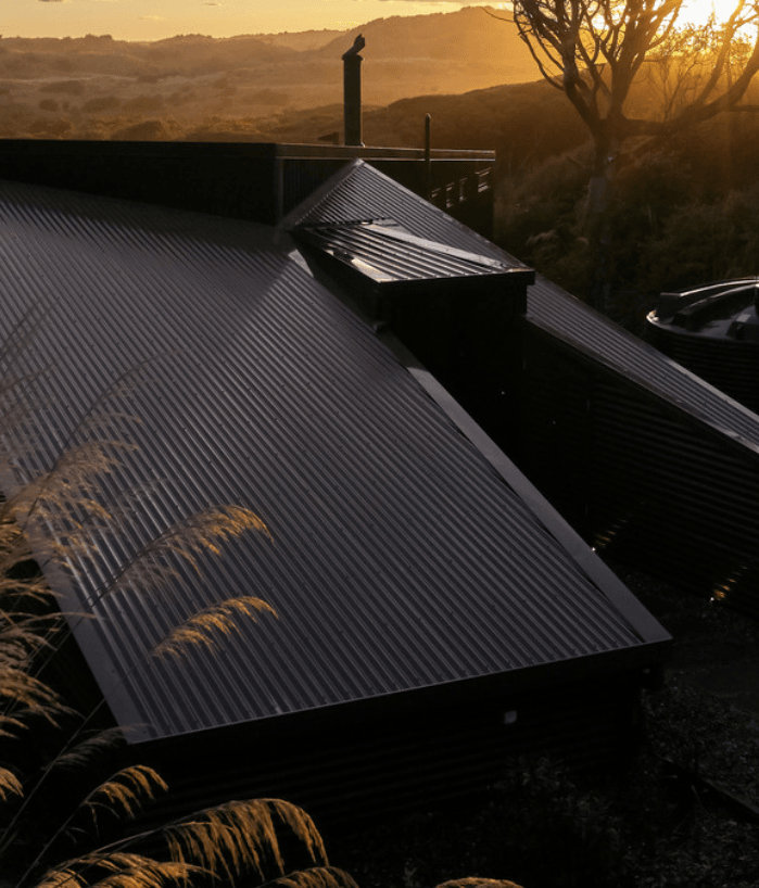 An intimate retreat hunkering down into its wild coastal site