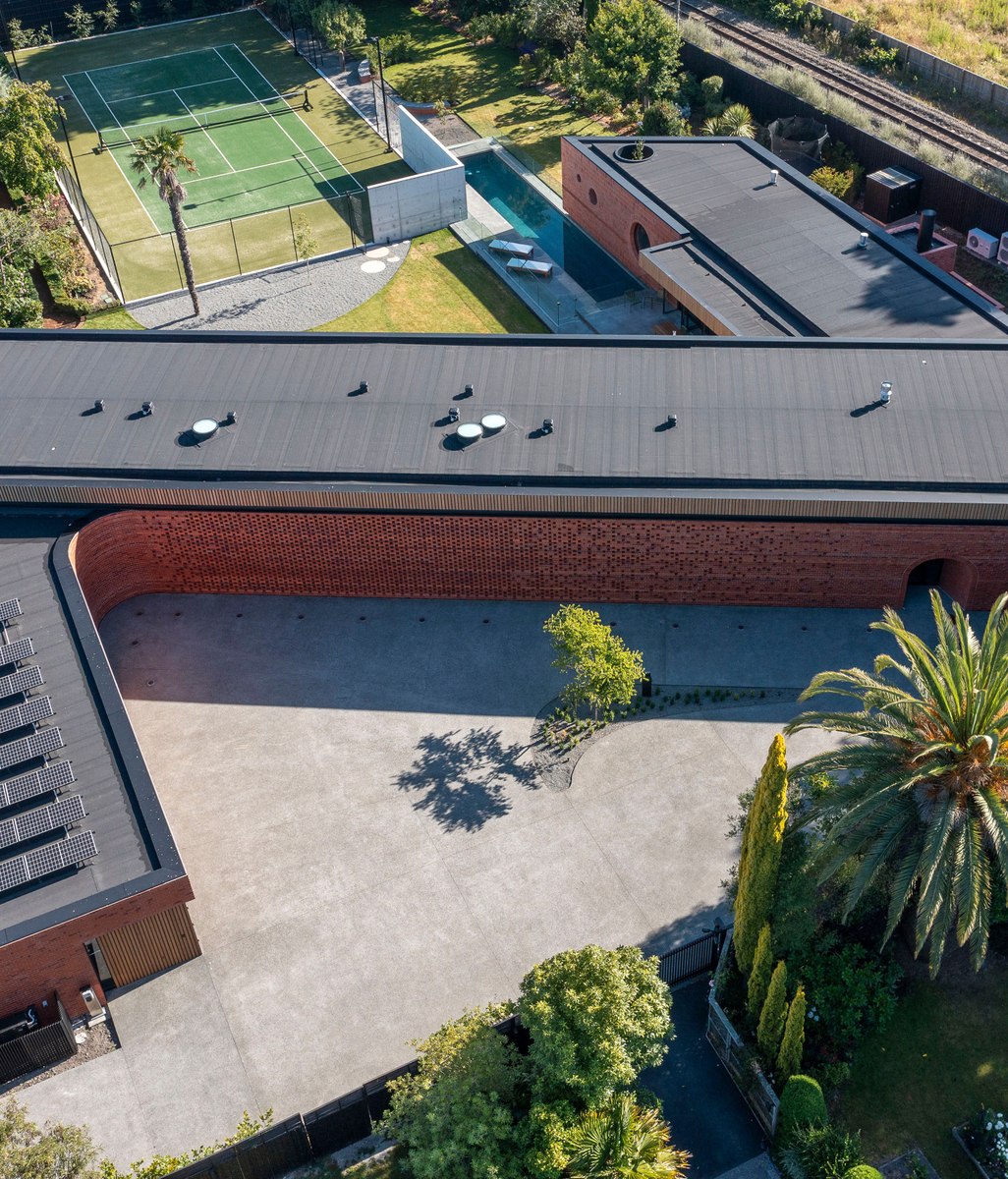 An energy-efficient roof is the cherry atop this unique Z-shaped home