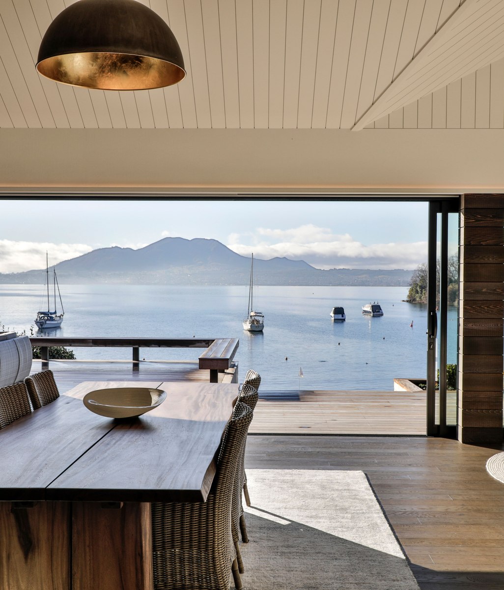This bespoke lakeside home showcases expert craftsmanship