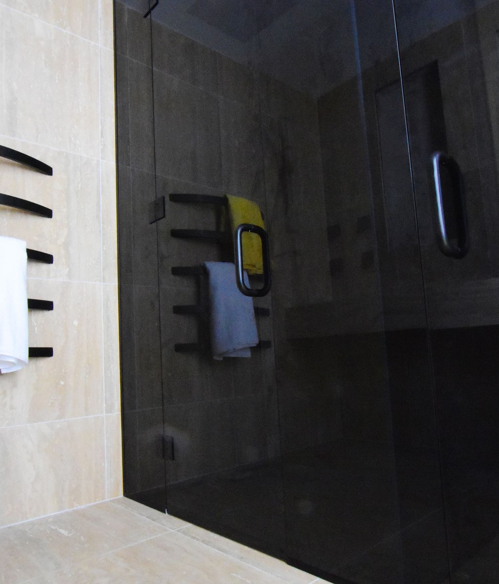 Moody bathrooms: the latest in tinted glass